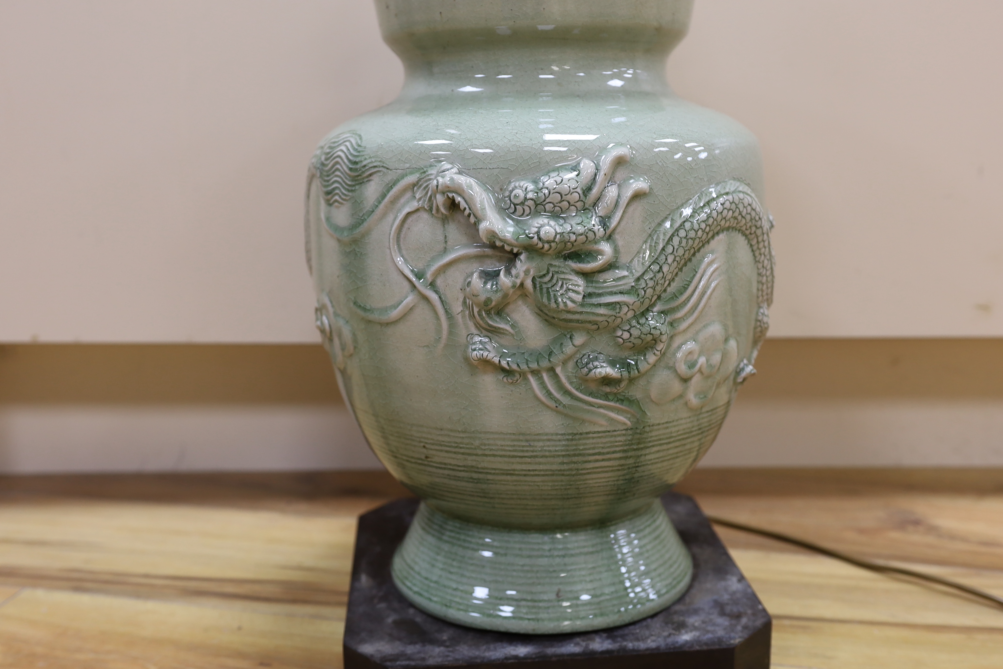 A Chinese celadon glazed lamp, 55cm high